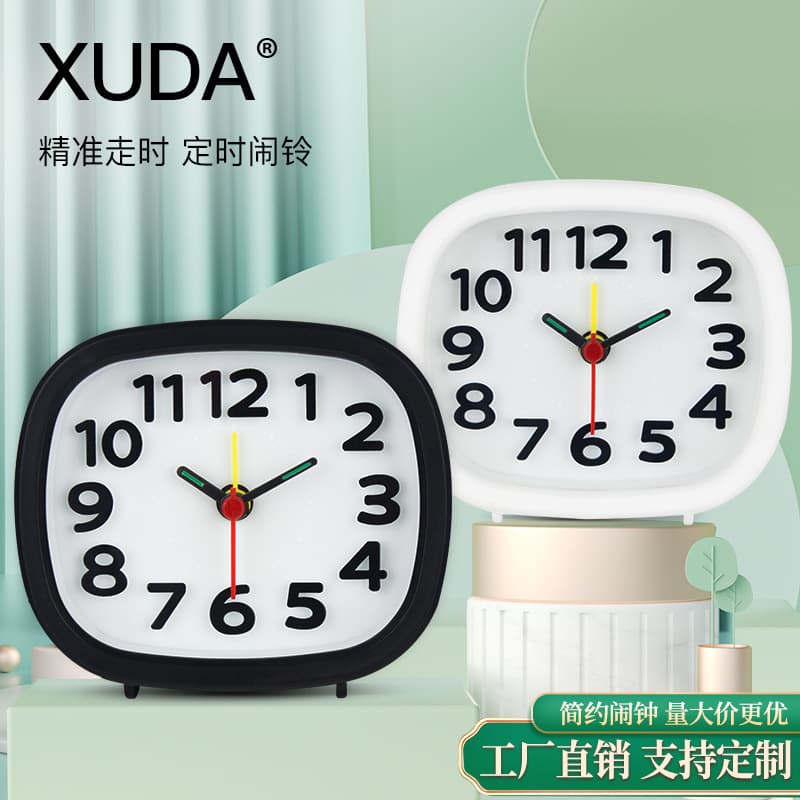 Simple and stylish alarm clock for home use, students, cartoon style, children's bedside alarm clock. Factory direct supply, in stock and wholesale.