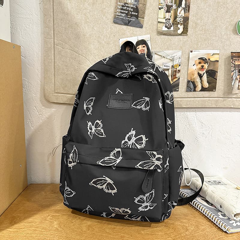 Japanese-style niche design butterfly backpack for women, versatile student school bag for college, casual travel backpack, laptop bag