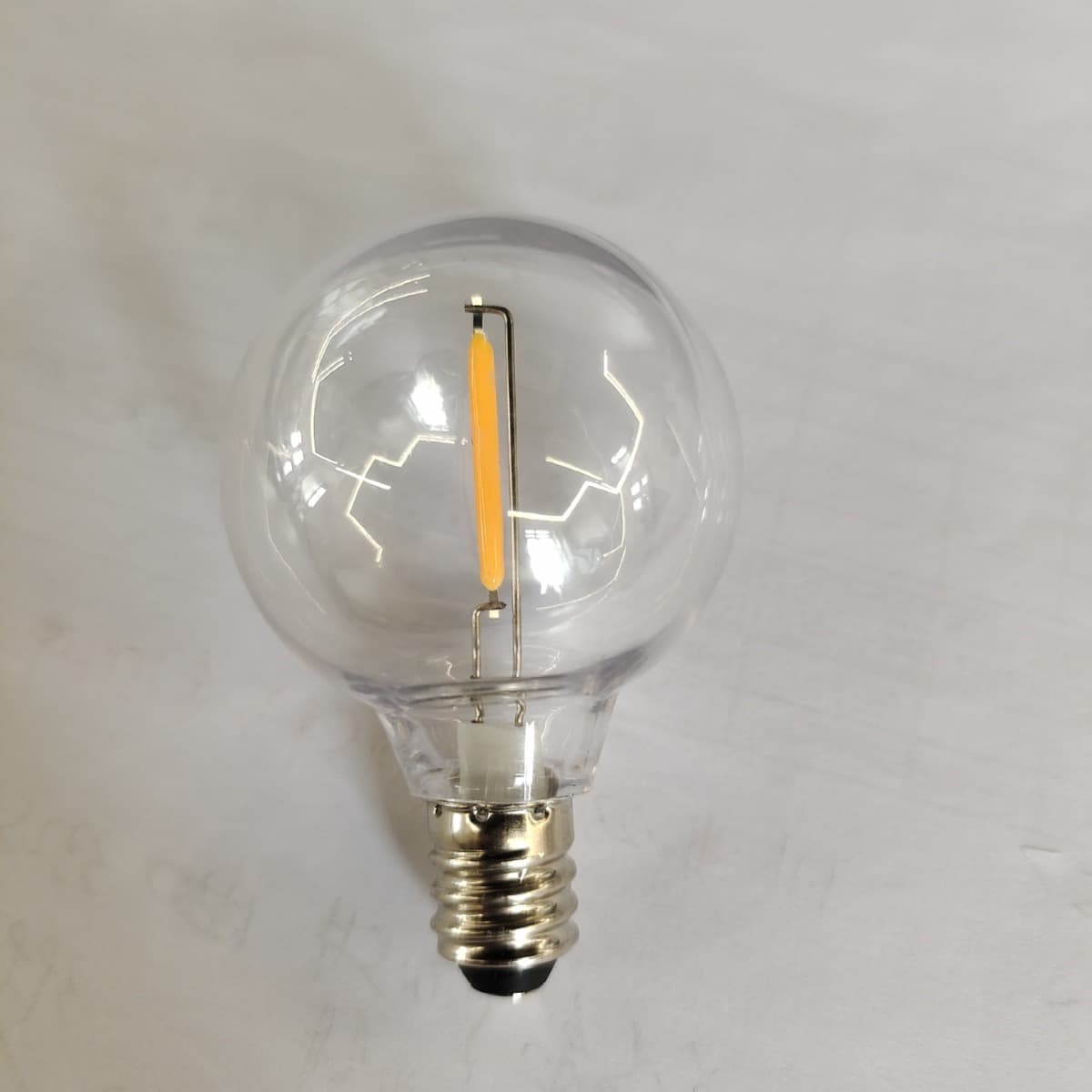 Manufacturer direct supply G40 tungsten filament clear LED bulbs for indoor/outdoor light strings, warm white E12 screw base outdoor bulb strings.