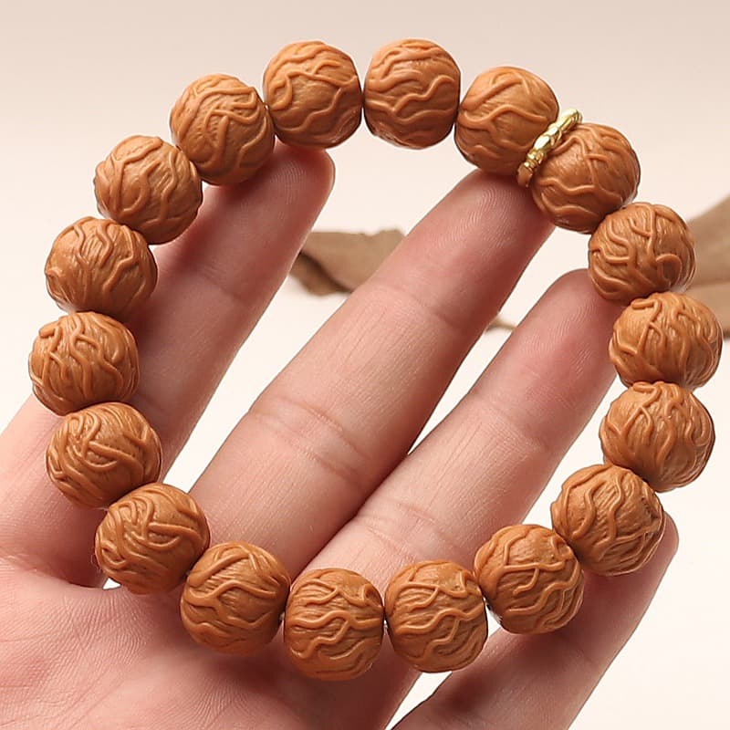 Factory direct supply of monkey head walnut carved bracelets for the wealthy, featuring a venomous design, perfect for handheld play and collecting.