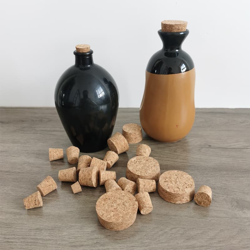 Wholesale cork stoppers, glass bottle stoppers, oak stoppers, beer stoppers, wine stoppers, bottle caps, conical corks, cork stopper manufacturers.