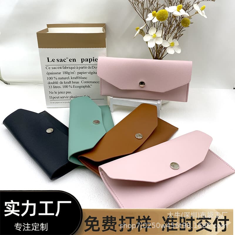 Factory wholesale wallets with snap closures, customizable, best-selling PU leather women's coin purses, fashionable clutches, and storage bags.