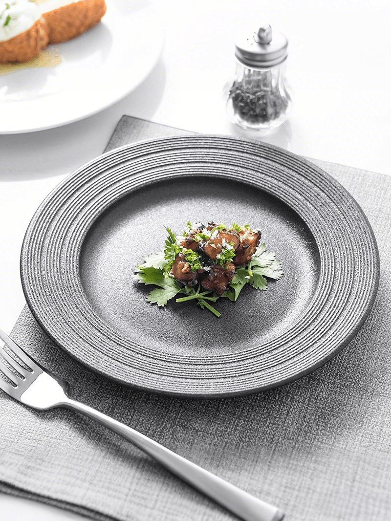 Steak plate ceramic round plate household dish plate Japanese solid color tableware shallow plate feeling flat plate pasta plate