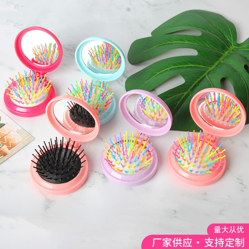 Manufacturer supplies folding air cushion combs, rainbow air cushion massage hair combs, compact and portable travel mirror combs.