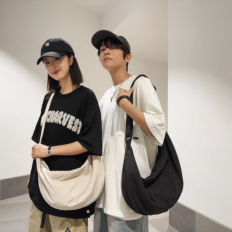 Large capacity crossbody bag, stylish travel bag, unisex dumpling bag, lightweight retro chest bag, cycling sports backpack