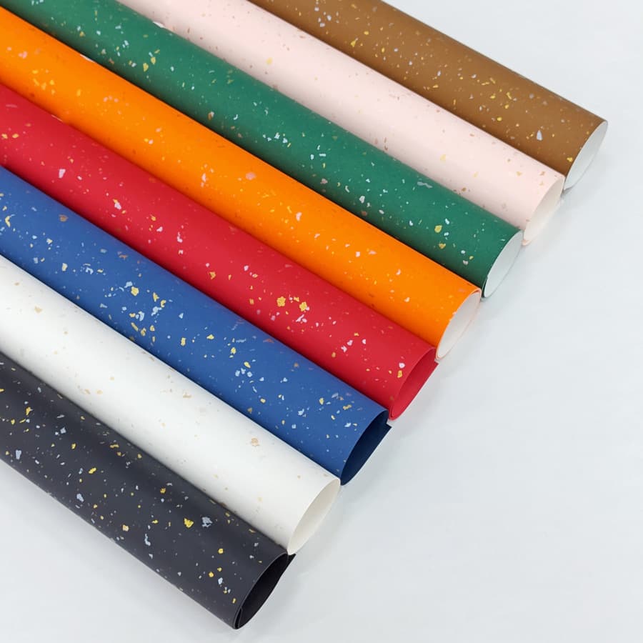 Wholesale of large sheets of specialty paper, thickened, with gold and silver speckles, for gift packaging, gift boxes, and handmade paper.
