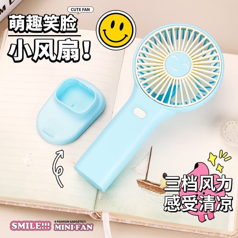 New Handheld Rechargeable Smiley Face Mini Fan Portable Desktop Phone Stand USB Charging Student Personal Fan
