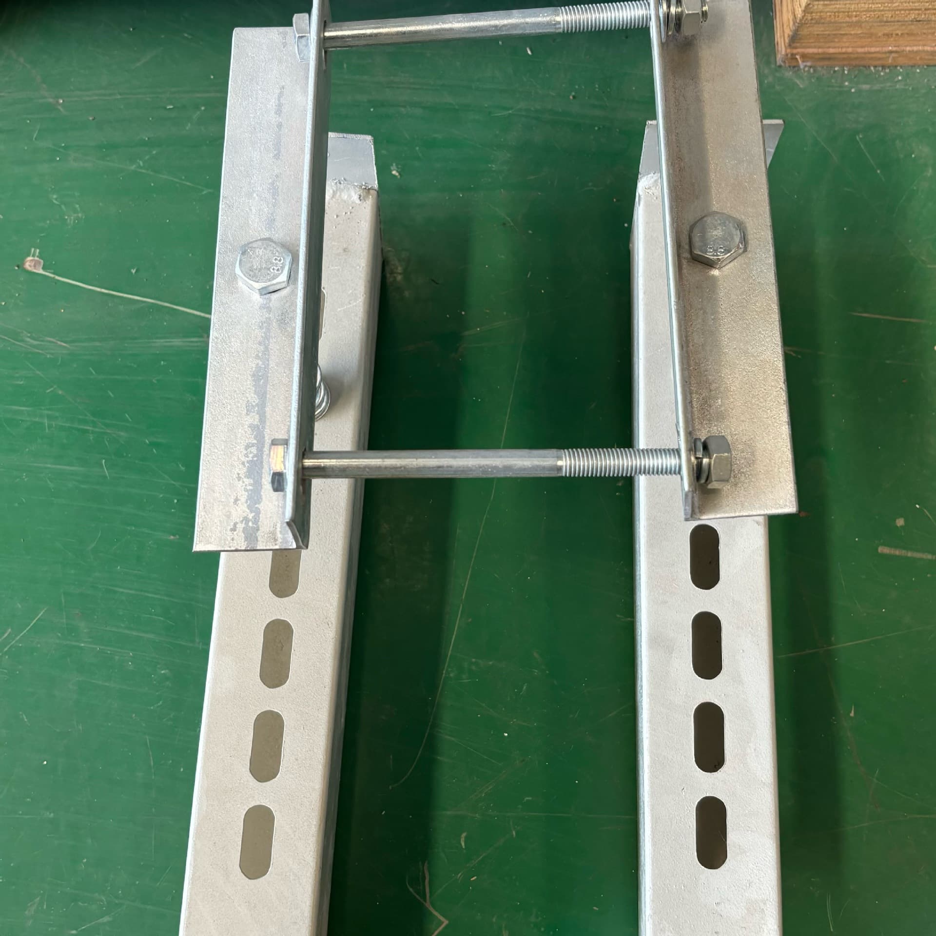 Waterproof spring bracket for high-density air-supported busbar trunking with exposed wiring.