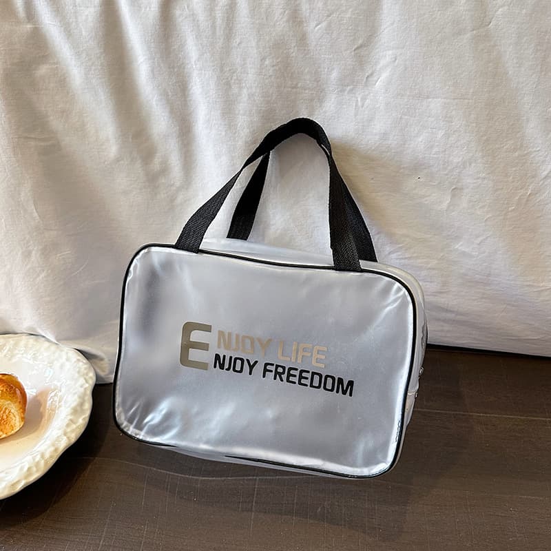 New style small fragrance simple letter mesh handbag hollow breathable cosmetic bag portable bathing and bathing mommy bag