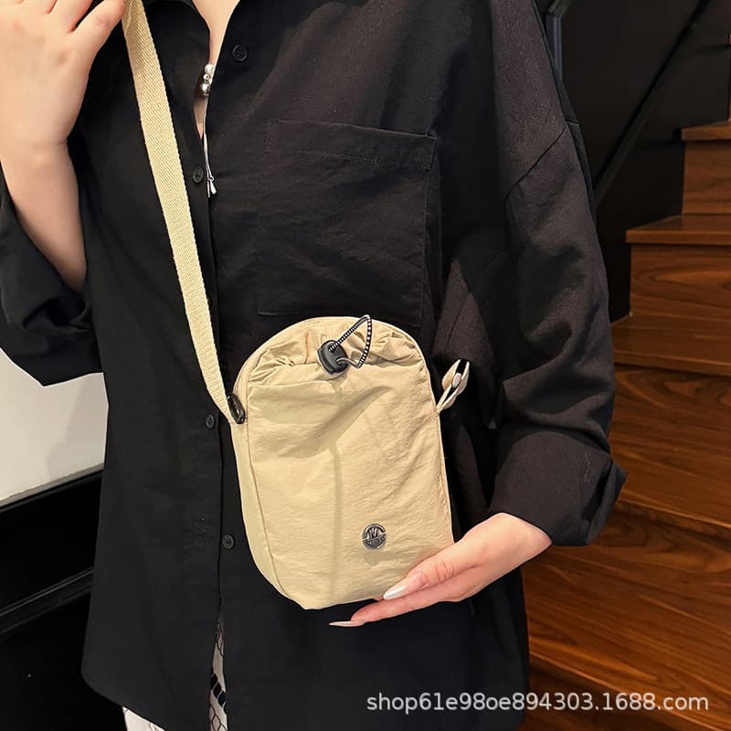 Sports mobile phone bag, new nylon multi-functional crossbody bag, men's and women's casual shoulder bag, fitness drawstring water cup bag