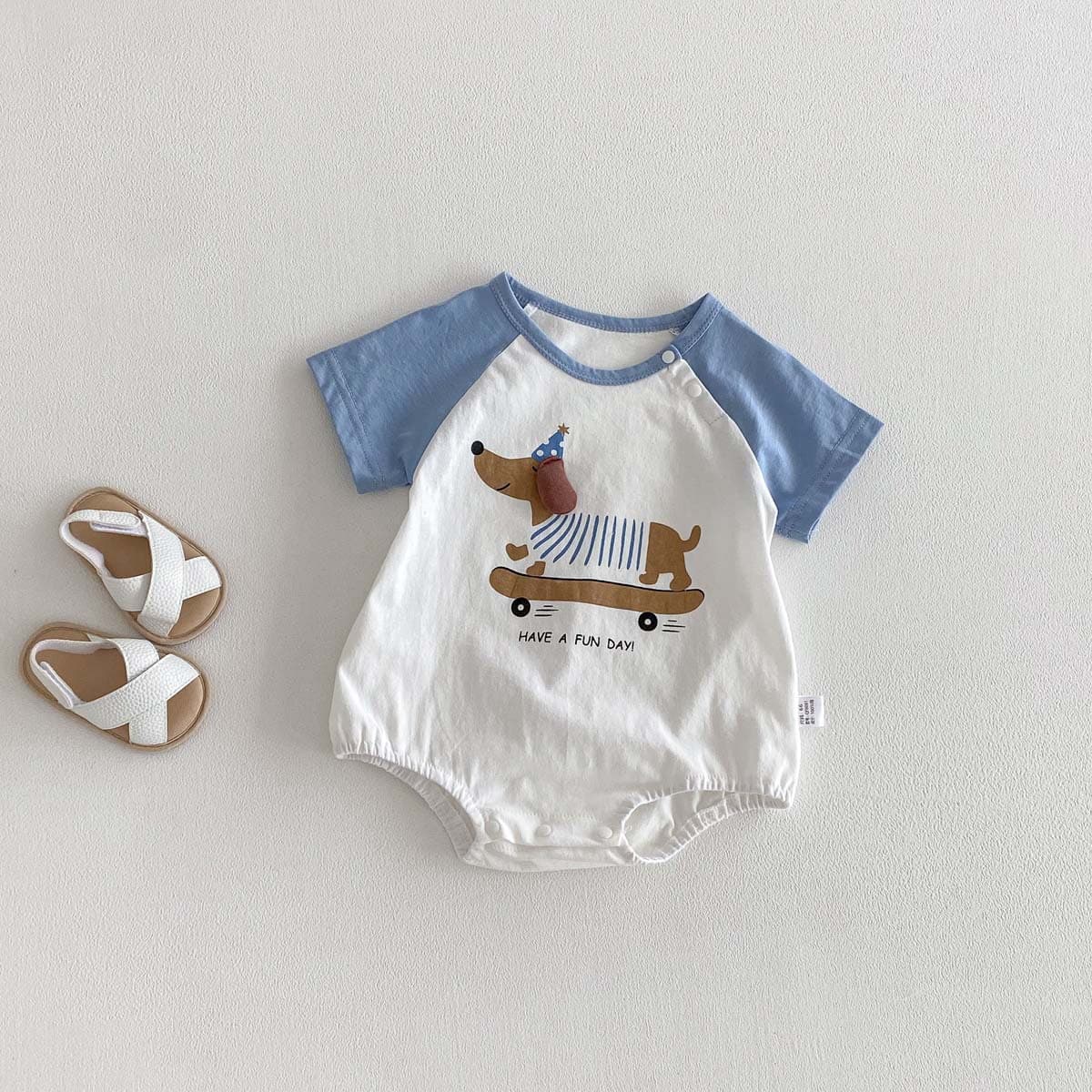 Spot children's clothing summer new short-sleeved fart clothing Korean version baby jumpsuit pure cotton open shoulder buckle baby clothes thin