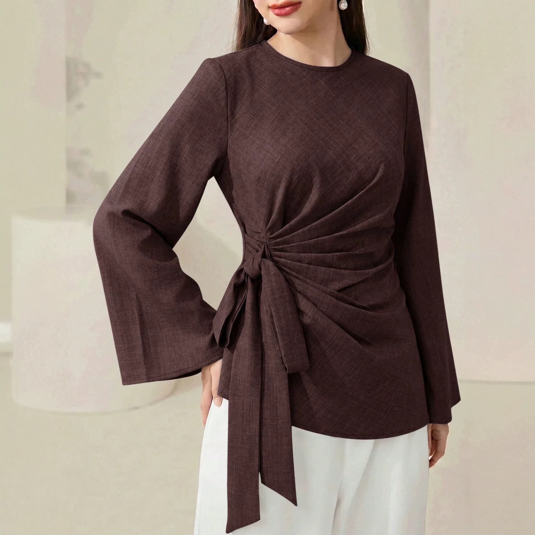 Cross-border foreign trade European and American clothing 2026 autumn new long-sleeved waist twist top temperament solid color round neck waist