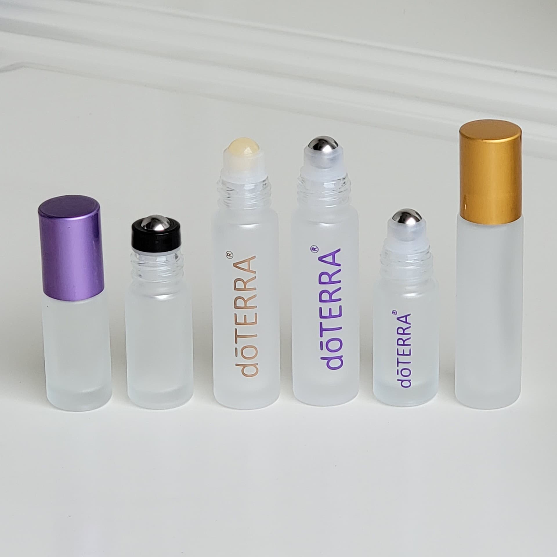 dōTERRA 10ml Roller Bottle with Frosted Gold Cap, Glass Refillable Essential Oil Bottle with Steel Ball, Amethyst Crystal, In Stock