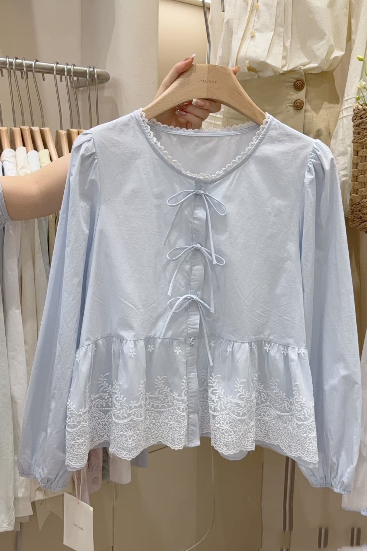 Korean age-reducing lace stitching bow blue round neck shirt for women with long sleeves, sweet, fresh, versatile and chic shirt