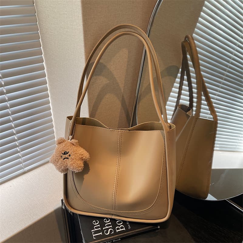Popular simple large-capacity bag fashionable women's handheld tote bag 2026 spring and summer new commuter shoulder bag