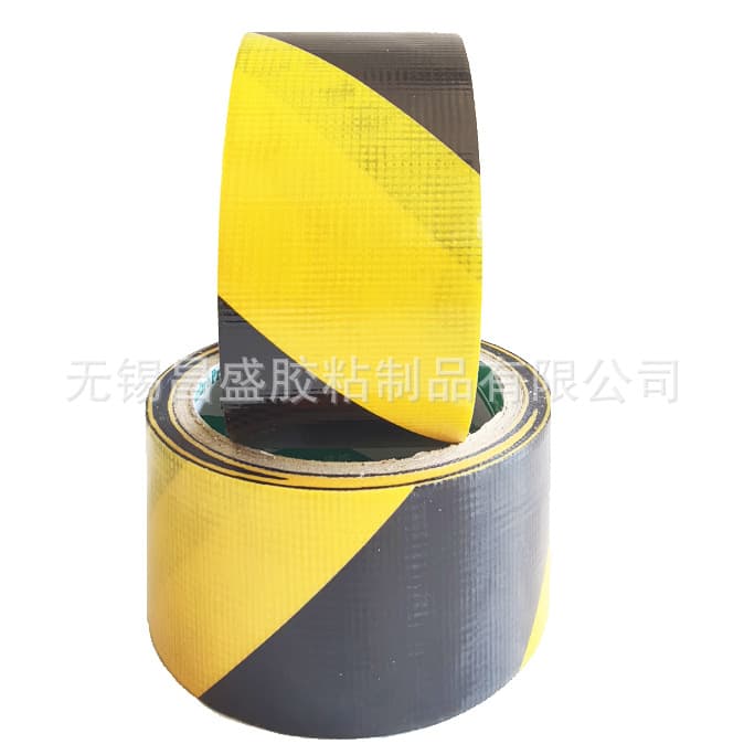 Easy-tear protective tape, PE woven, residue-free, yellow and black warning labels, leaves no residue, easy-tear protective film.