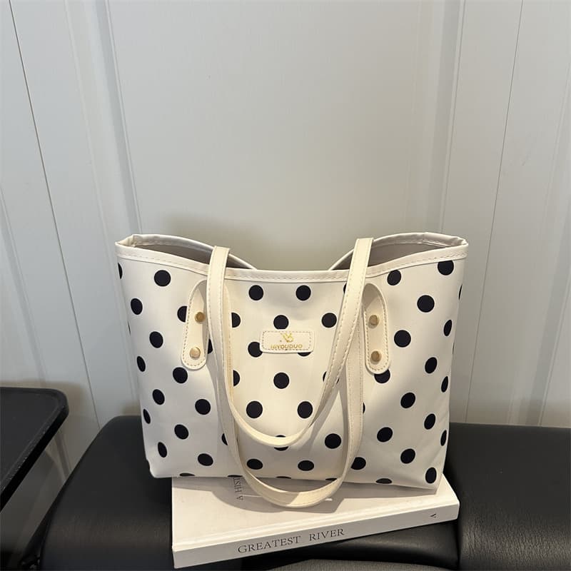 Fashionable polka dot canvas bag for women 2026 new commuter large capacity shoulder bag casual contrasting color portable tote bag