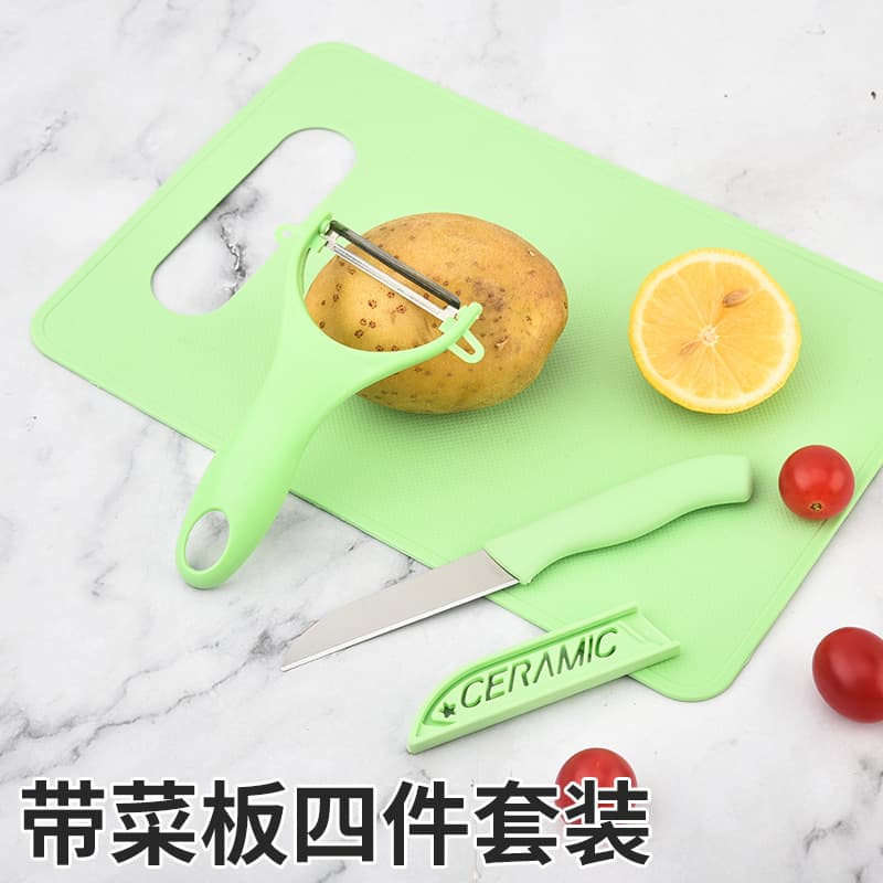 Stainless steel four-piece knife set with cutting board, household kitchen knife, fruit knife, peeler, and cutting board.