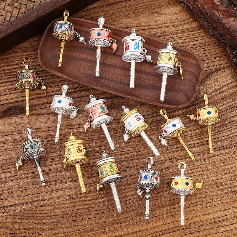 Tibetan-style alloy enamel-dropped Six-Syllable Mantra hand-cranked prayer wheel pendant, ethnic-style pendant keychain wholesale crafts