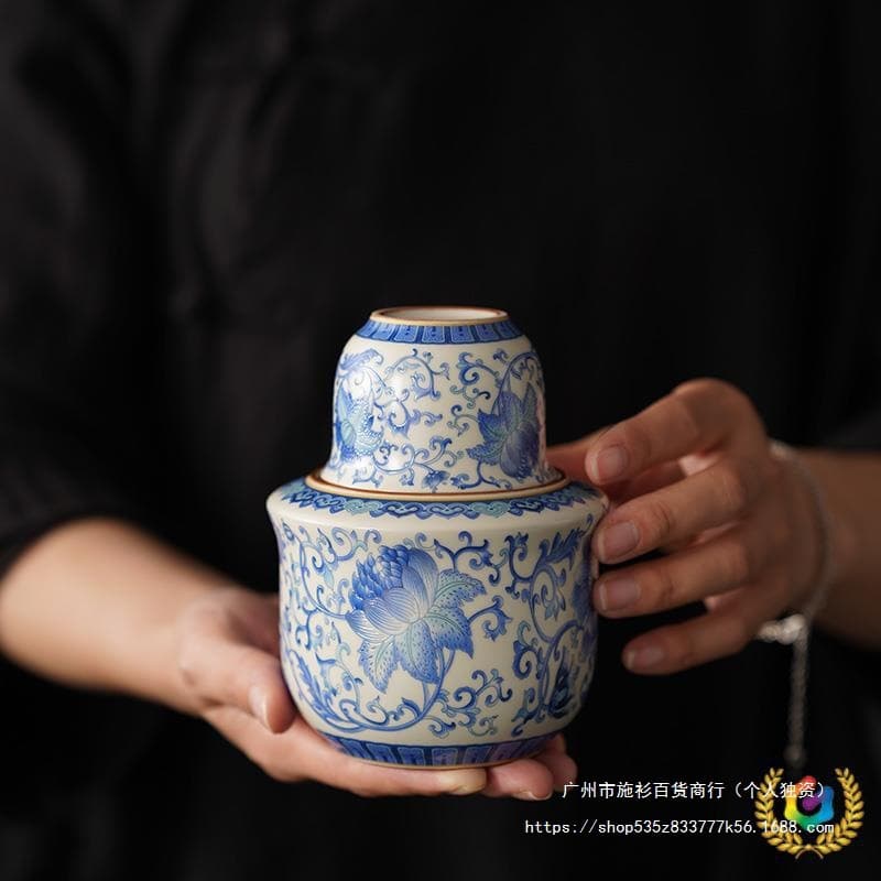 Home ceramic three-tael blue-and-white Ru kiln-style wine warmer set for heating white and yellow rice wines.