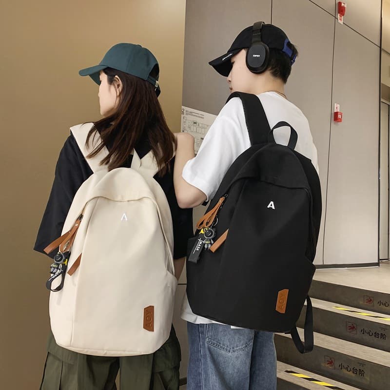 Cross-border solid color minimalist backpack for men, large capacity casual travel backpack for women, middle school, high school, and college students commuting school bag