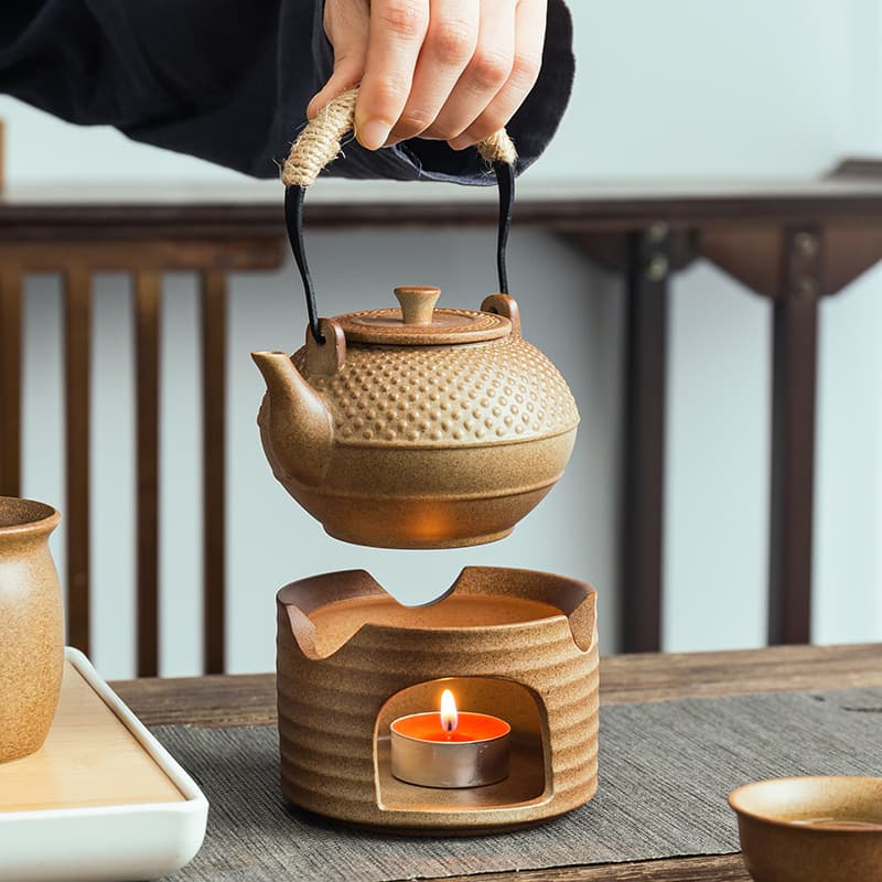 Candle-warmed ceramic pot for slow-cooking wine, heating yellow rice wine, and keeping beverages hot, also suitable for tea and milk.