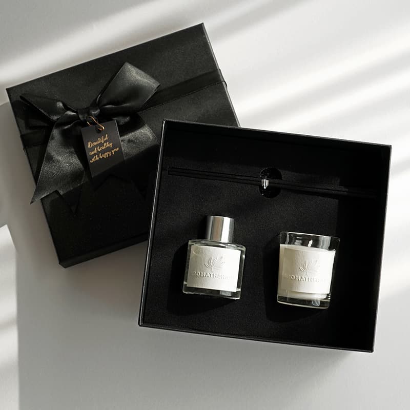 Manufacturer's ready-made fireless aromatherapy gift box with high-end feel. Gift rattan aromatherapy candle set box with logo printing