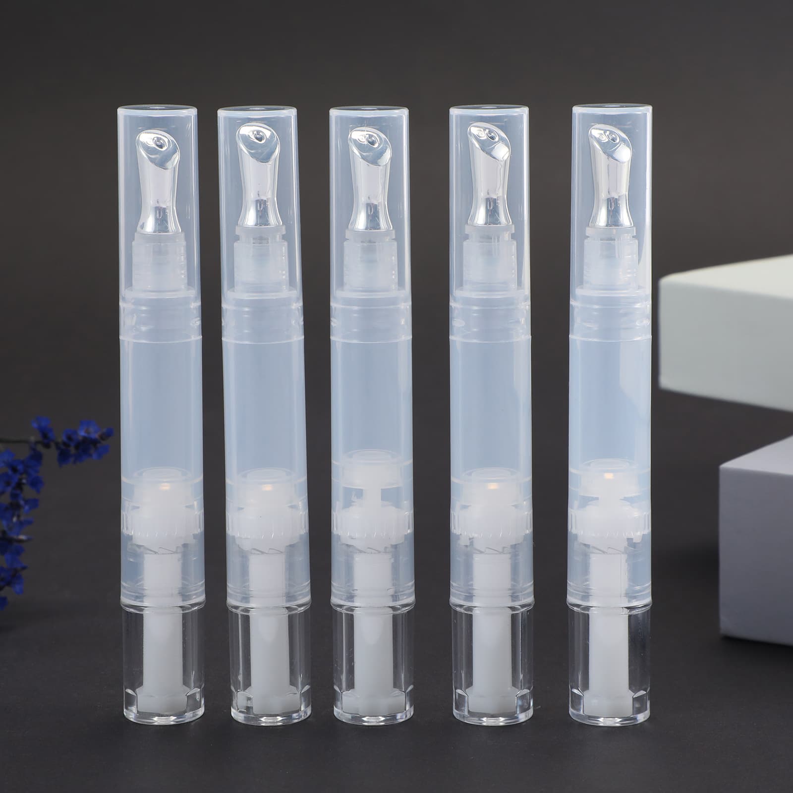 Ready stock lip glaze bottles, eye essence, metal massage head, rotating pen, makeup packaging materials