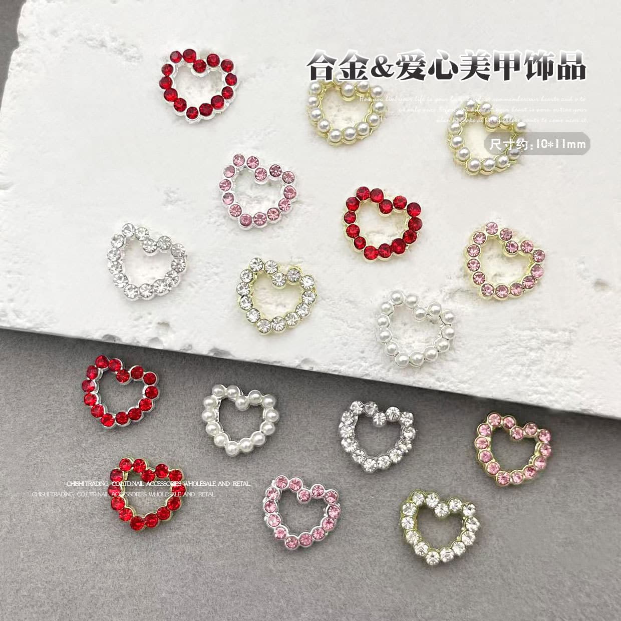 Cross-border popular alloy love manicure jewelry hollow heart three-dimensional pearl nail accessories wholesale