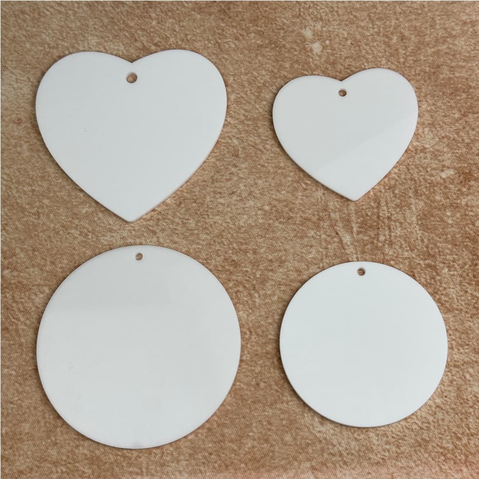 Acrylic heart-shaped blank pendant tag.