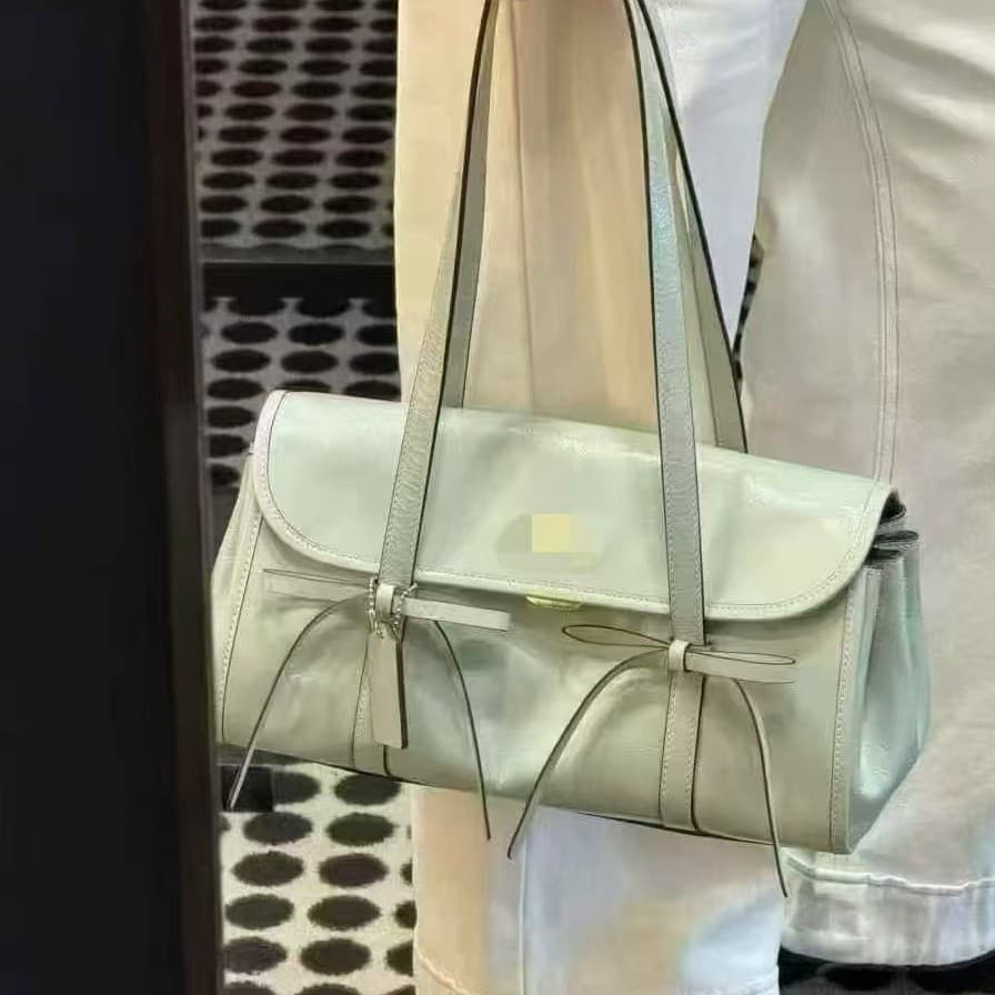 Kou C's new women's Bridget bow baguette underarm bag retro one-shoulder portable bowling commuter tote