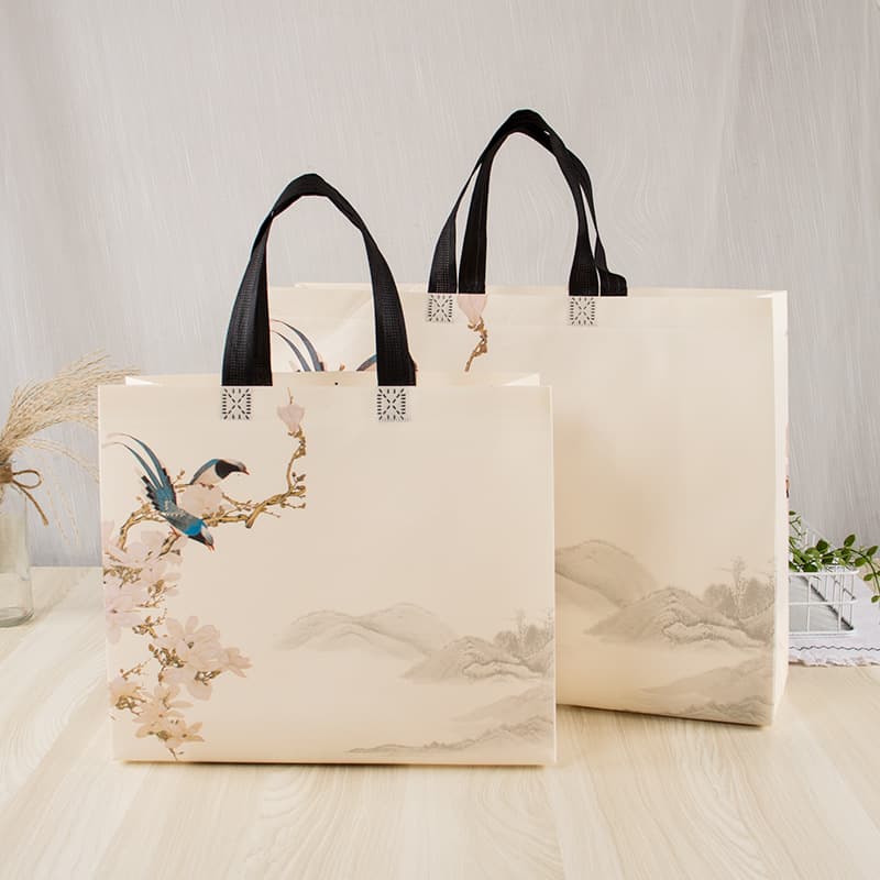 Guofeng creative film-coated non-woven clothing cheongsam bag LOGO national tide gift bag color printing advertising non-woven antique