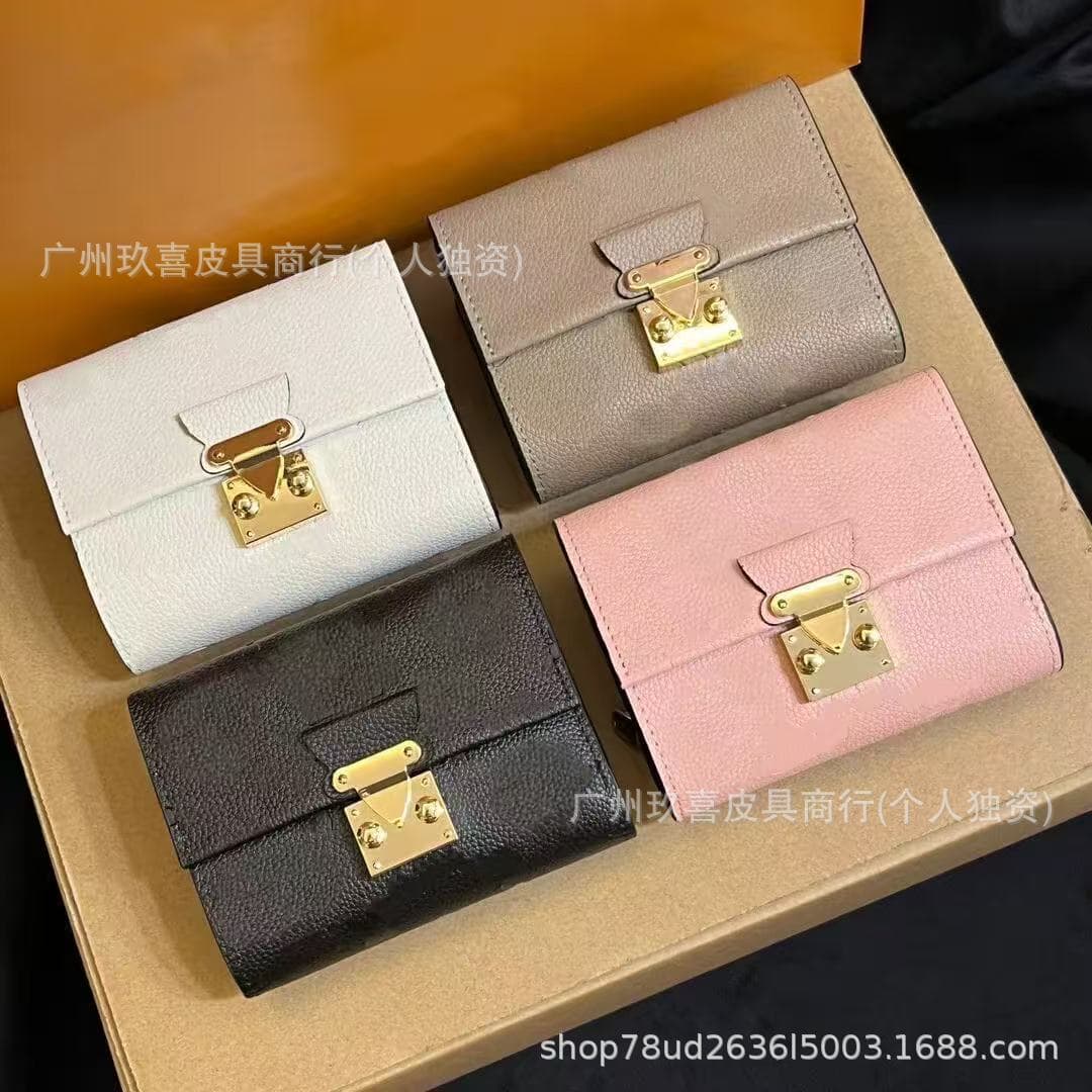 New unisex genuine leather wallet mini portable short wallet wallet classic embossed 30% off fashionable change