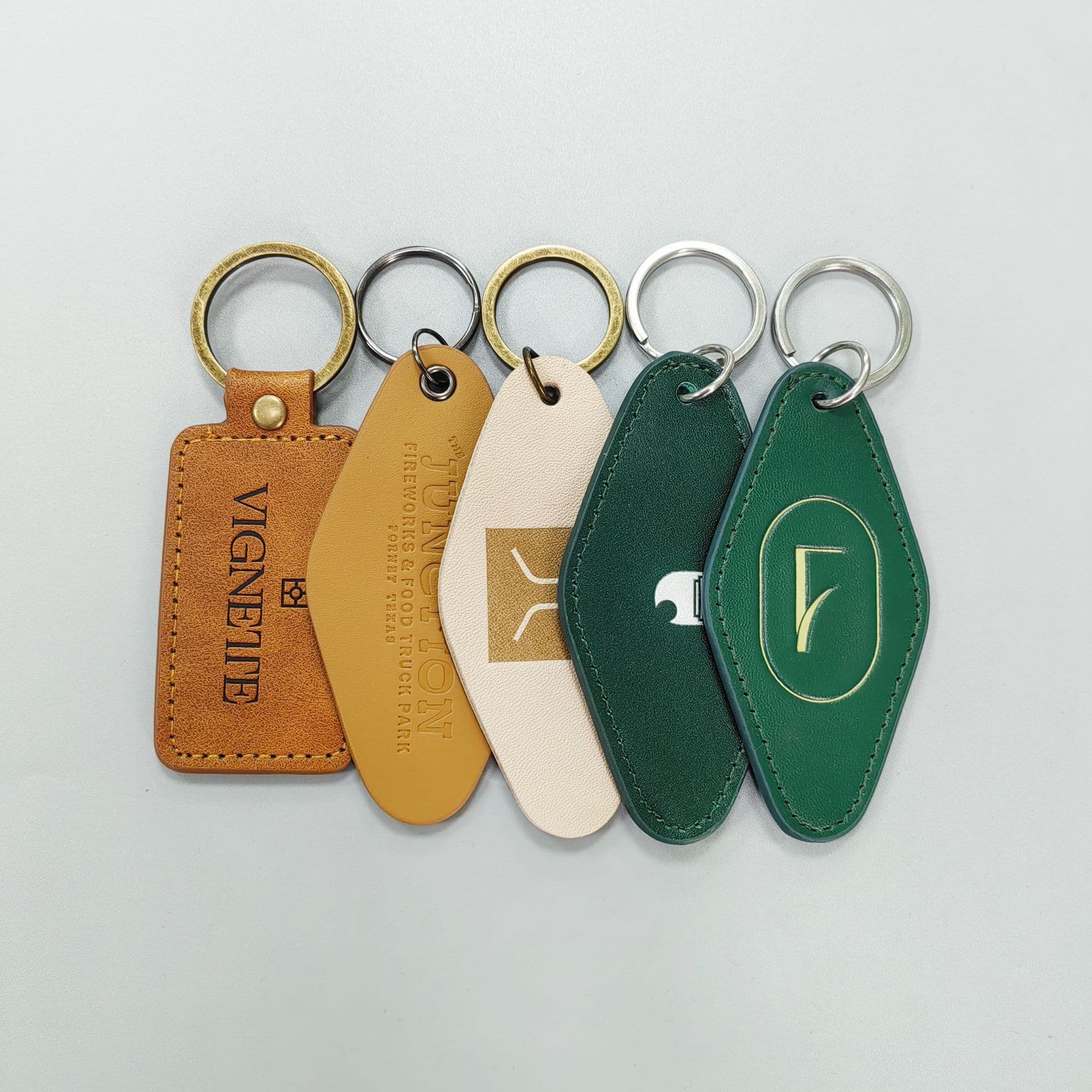 Customized leather keychain PU hot silver embossed pendant hotel number plate access control printed leather keychain