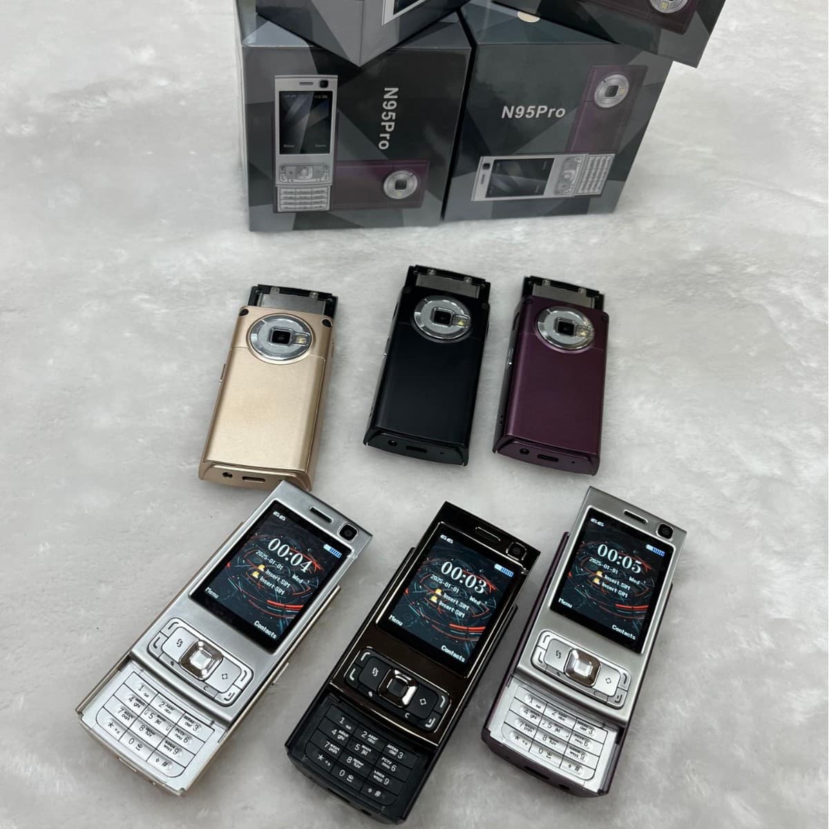 Cross-border foreign trade N95 pro non-intelligent backup mobile phone key machine slider fashion small mobile phone mini elderly machine