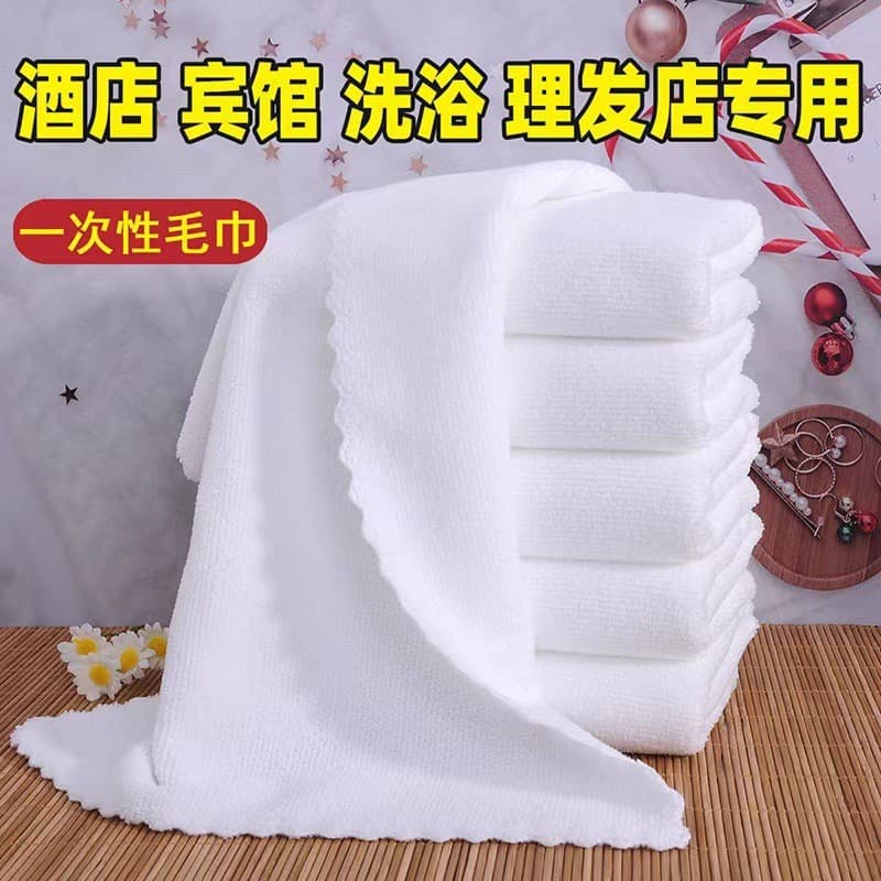 Disposable white towels for hotels, bathhouses, foot massages, and funerals.