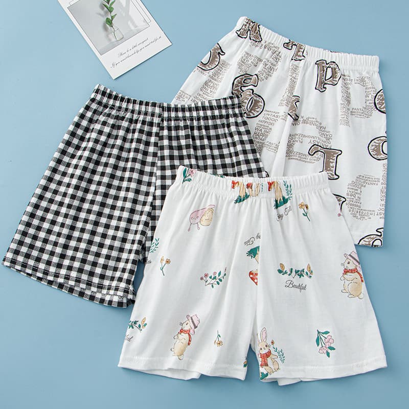 Summer children's beach pants, teenagers' casual home pants, cartoon printed parent-child wear, boys and girls' three-quarter pants wholesale