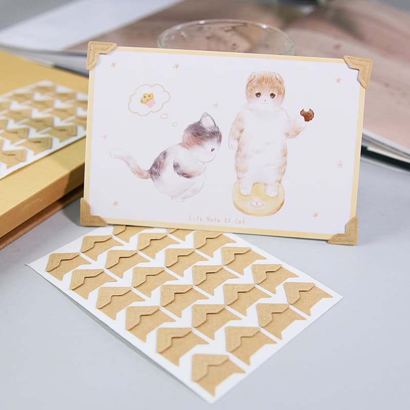 Kraft paper corner stickers for DIY photo albums. 24 stickers/sheet. Free shipping on orders over 100 sheets.