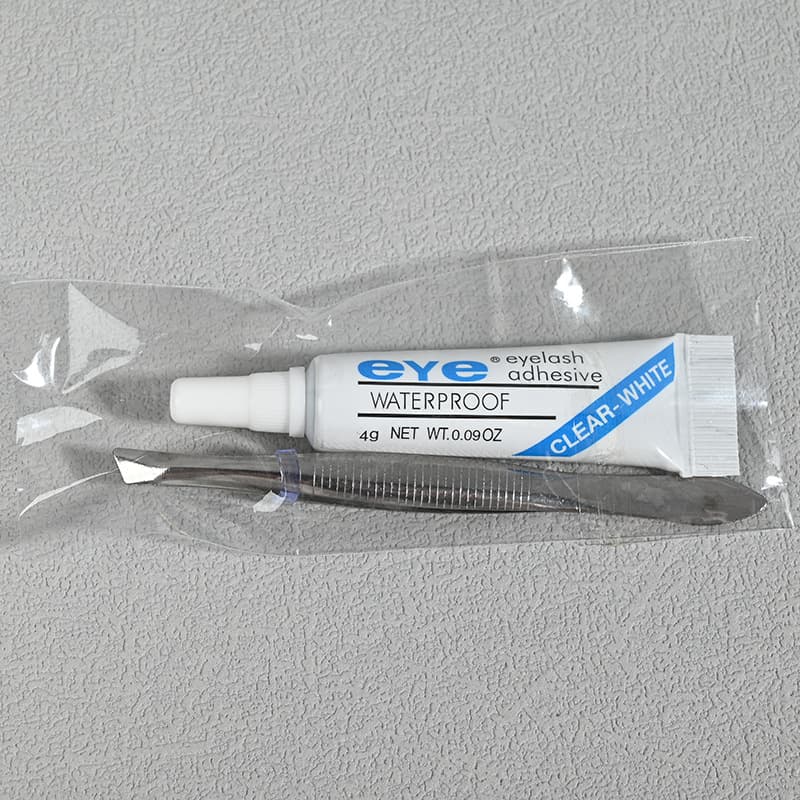 4g eyelash glue with tweezers for assisting with false eyelashes, wholesale eyelash glue for beautiful eyes.