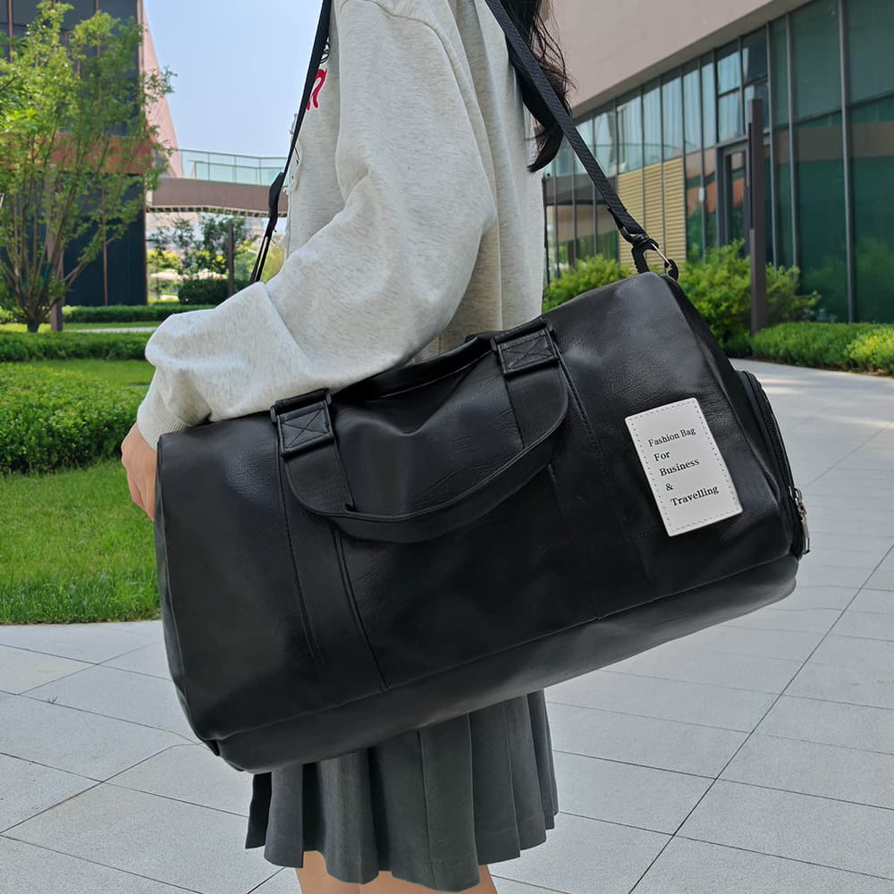 Men's travel bag large capacity crossbody portable leather waterproof luggage bag women's sports and leisure bag men's fitness bag