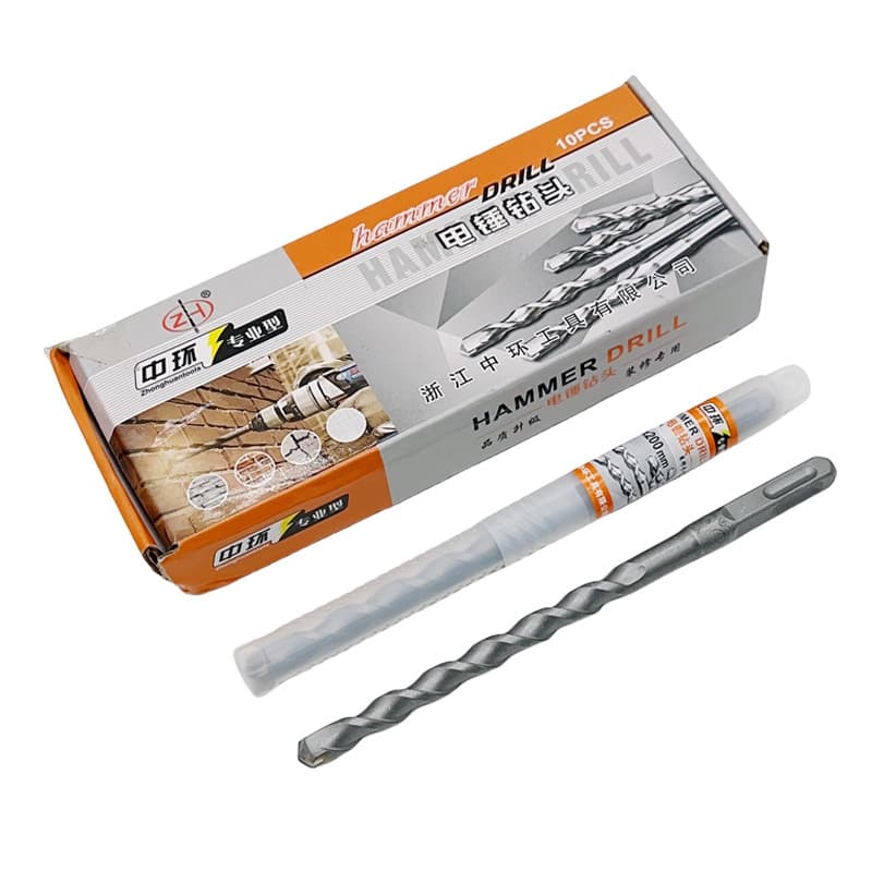Square shank four-flute carbide hammer drill bit for drilling through concrete and cement walls in construction.