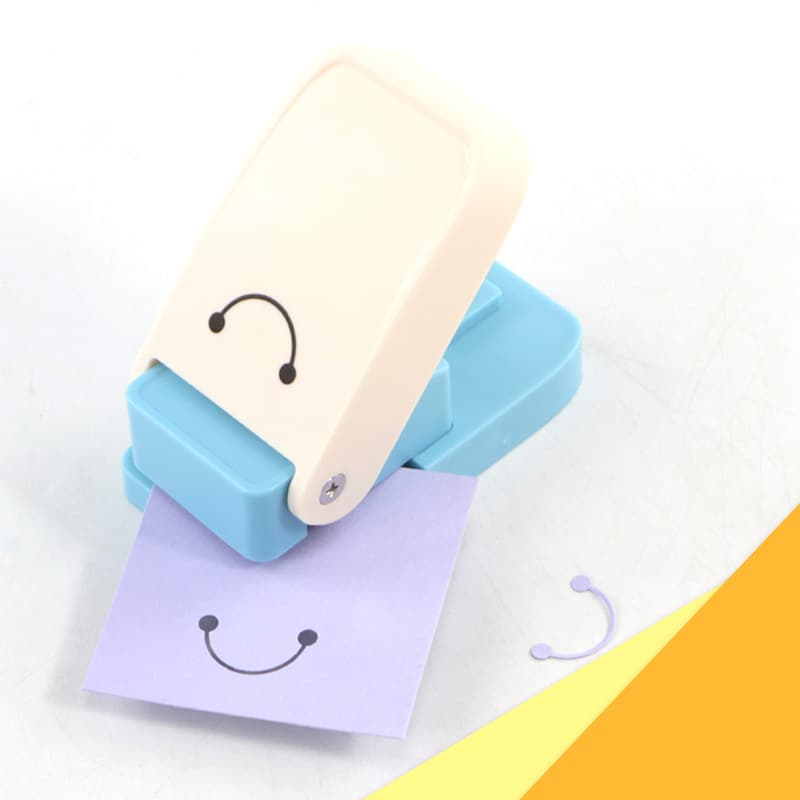 Keychain embosser for handmade DIY smiley face pattern punch, children's educational toy embossing machine wholesale.