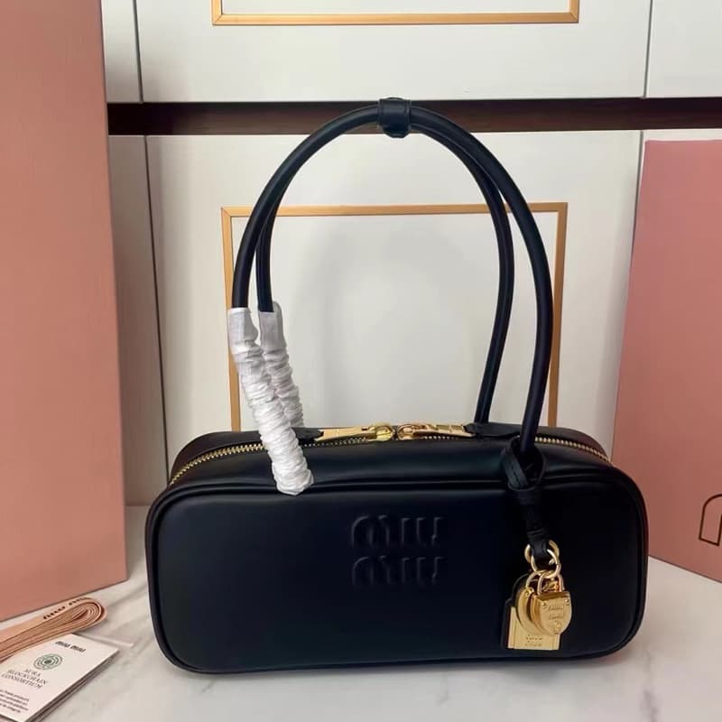 2025Miu New Long Handle Bowling Boston Pillow Bag Fashionable and Versatile One-Shoulder Satchel Commuter Bag for Women
