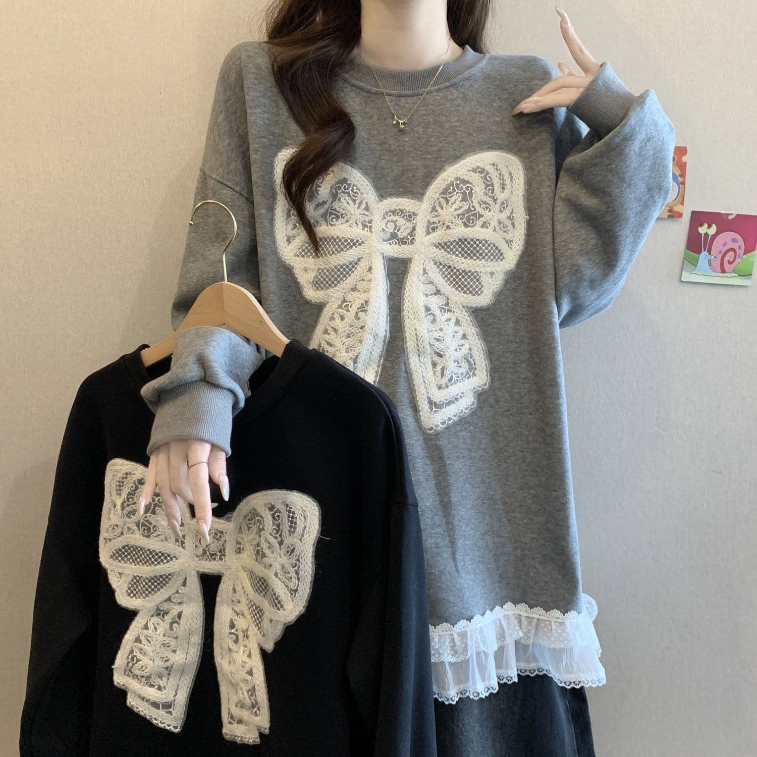 Large size hook lace bow round neck long-sleeved T-shirt women's spring and autumn new loose slim fashion mid-length top