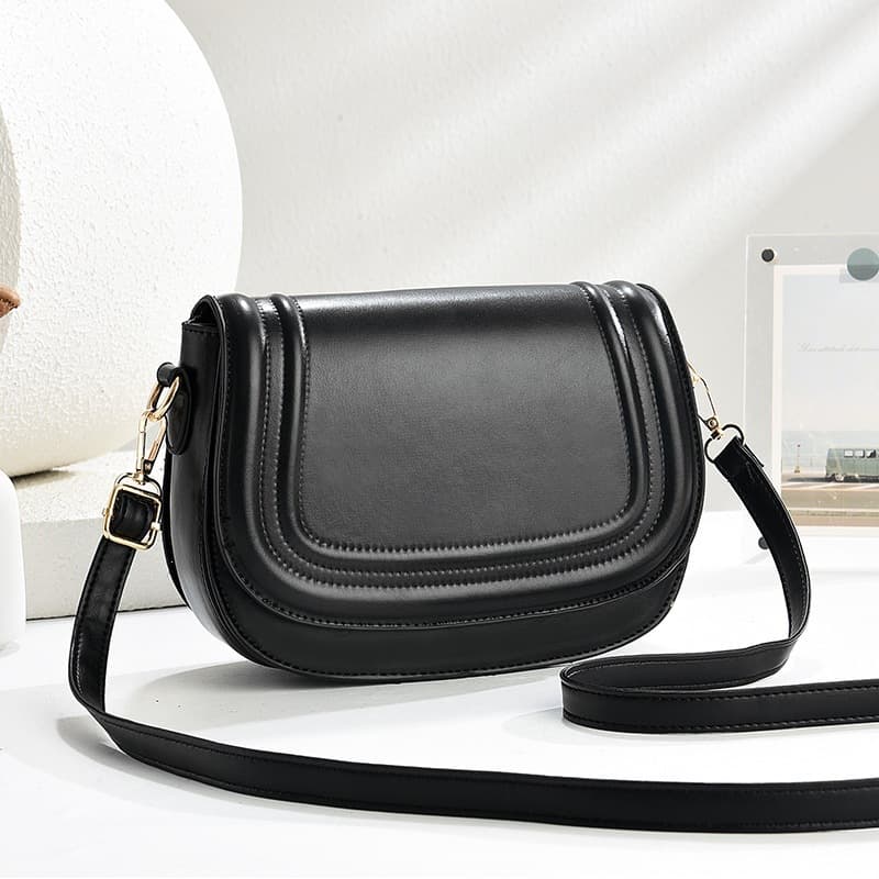 2025 New Saddle Bag Women's Bag Niche Design Horseshoe Bag Solid Color Flip Impression Fashion Women's Crossbody Bag