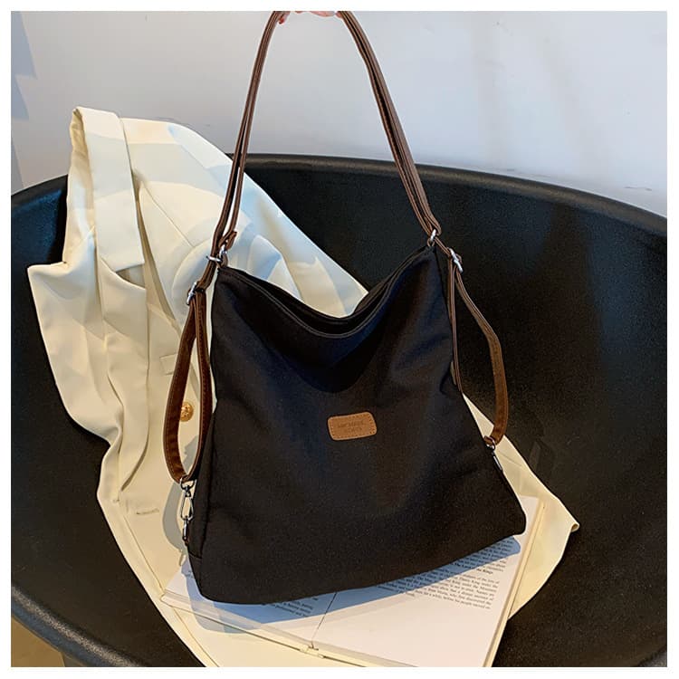 University Commuting Backpack Student Nylon Cloth Bag 2026 Women's New Autumn and Spring Large Capacity Single Shoulder Armpit Support