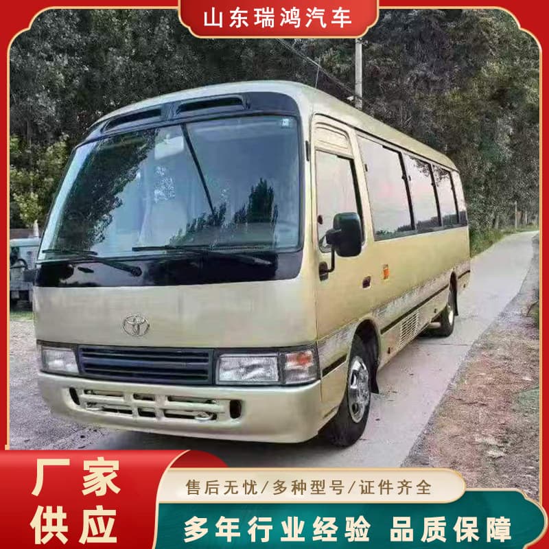 Factory direct sales of used luxury 20-seater Toyota Coaster buses with automatic doors, non-slip tires, wooden flooring, and meeting National III emission standards.