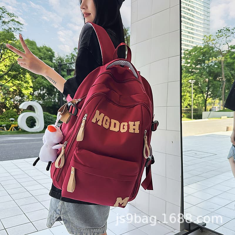 Large-capacity schoolbag for female junior high school students and primary school students, fashionable and versatile schoolbag, Korean style new strong and durable backpack for men