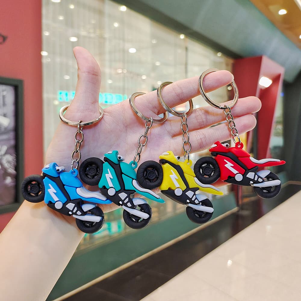 Creative motorcycle keychain cartoon small pendant pvc soft keychain bag wholesale gift gift couple