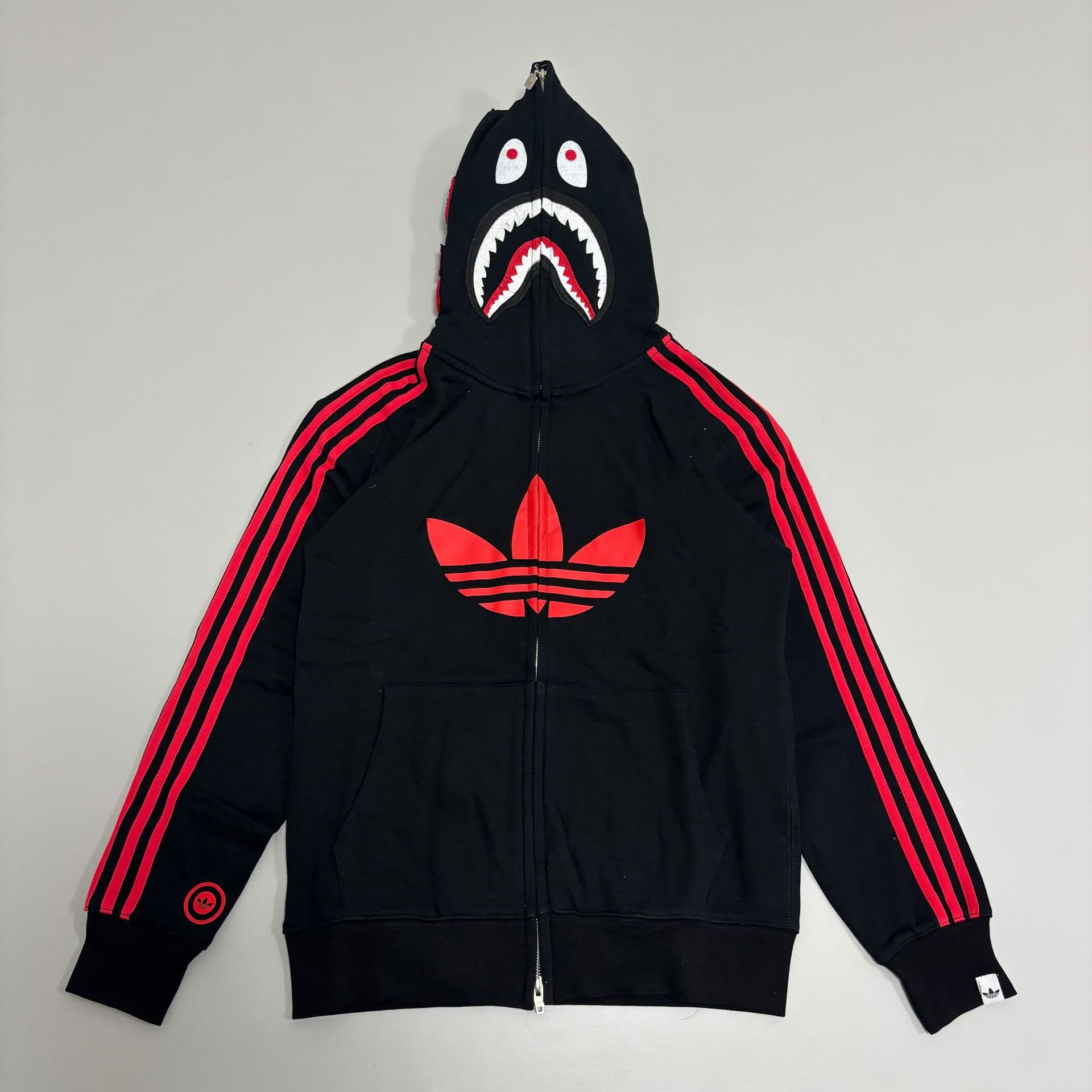 Trendy Adidas Collaboration SS26 Classic Stripe Zip Jacket Shark Head Camo Zip Hoodie